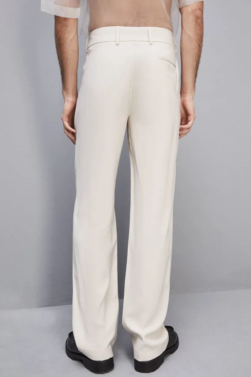 Spodnie slim fit ze wpuszczanymi kieszeniami