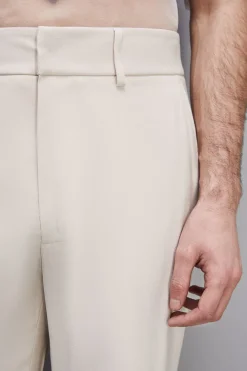 Spodnie slim fit ze wpuszczanymi kieszeniami