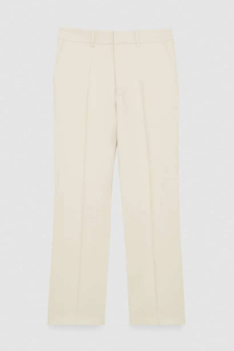 Spodnie slim fit ze wpuszczanymi kieszeniami